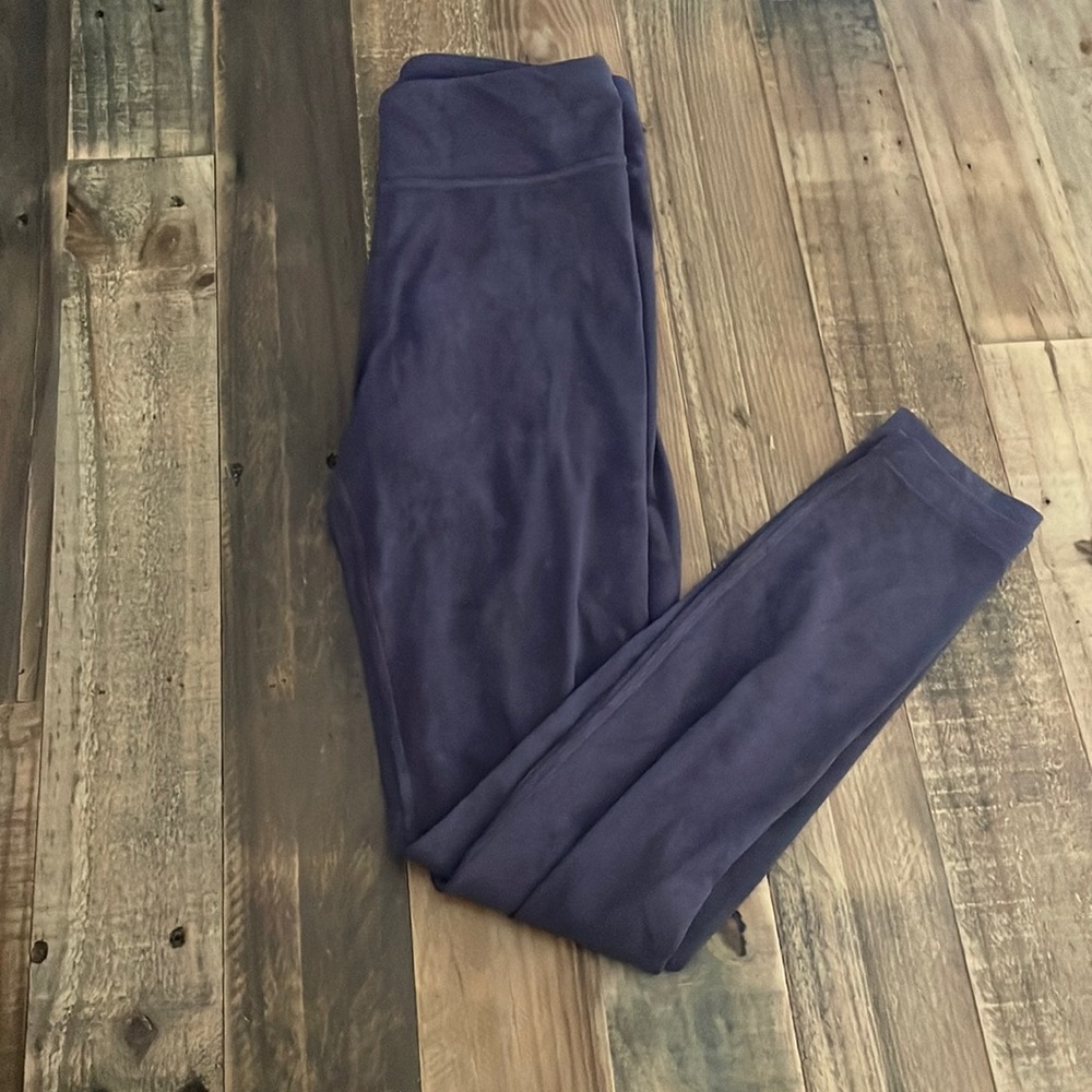 These are purple marble leggings from Athleta Girl. Size L/12.
